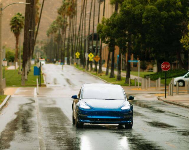 Car on rainy road Car on rainy road